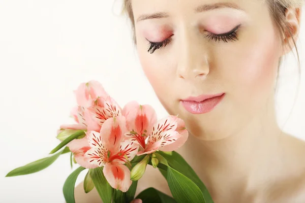 Pretty portrait young fresh blonde girl with flowers.studio — Stock Photo, Image