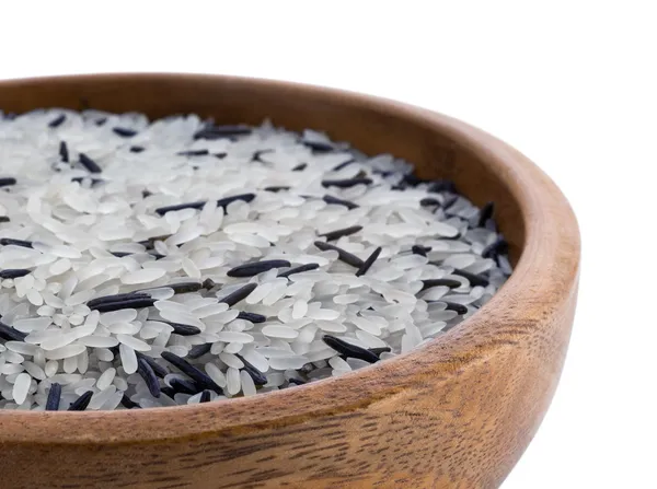 Raw rice in bowl — Stock Photo, Image