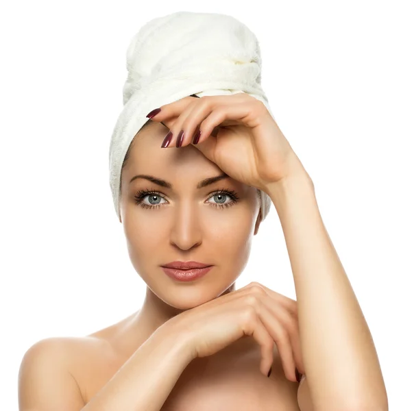 Beautiful woman with a towel on his head — Stock Photo, Image