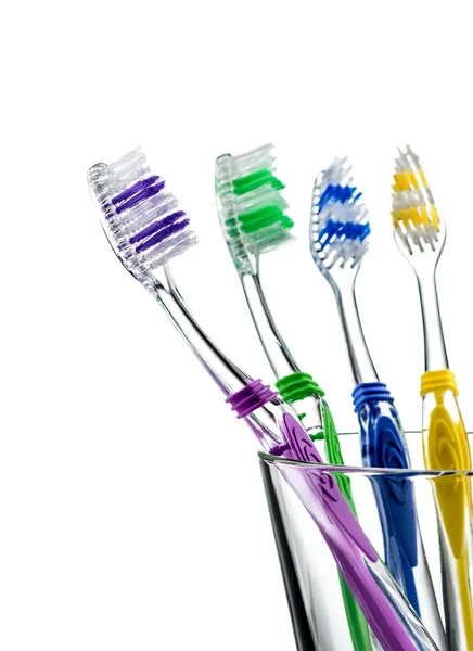 Tandenborstels in een glas — Stockfoto