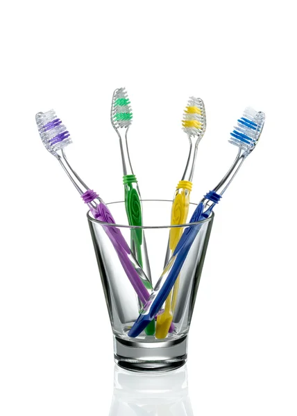 Toothbrushes in a glass — Stock Photo, Image