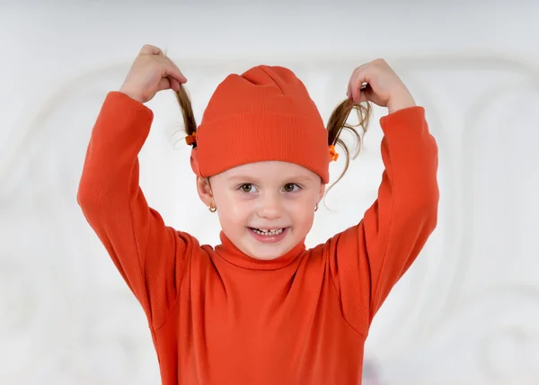 Dziecko w czerwonym kapeluszu — Zdjęcie stockowe