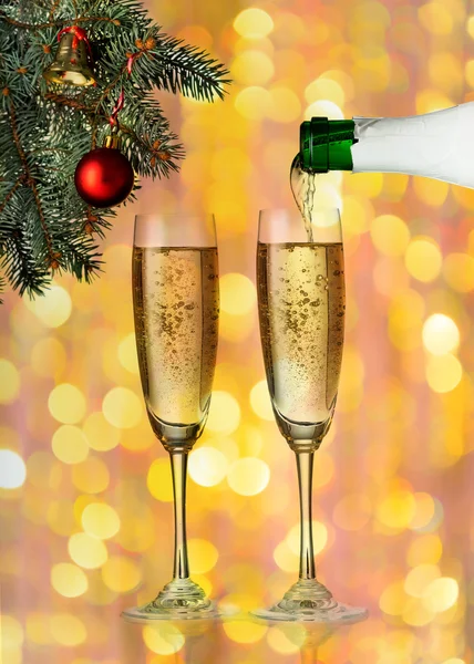 Flutes of champagne in holiday setting. — Stock Photo, Image