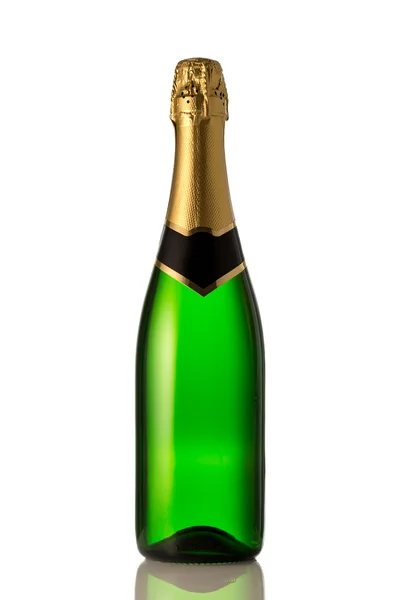 Bouteille verte de champagne devant fond blanc — Photo