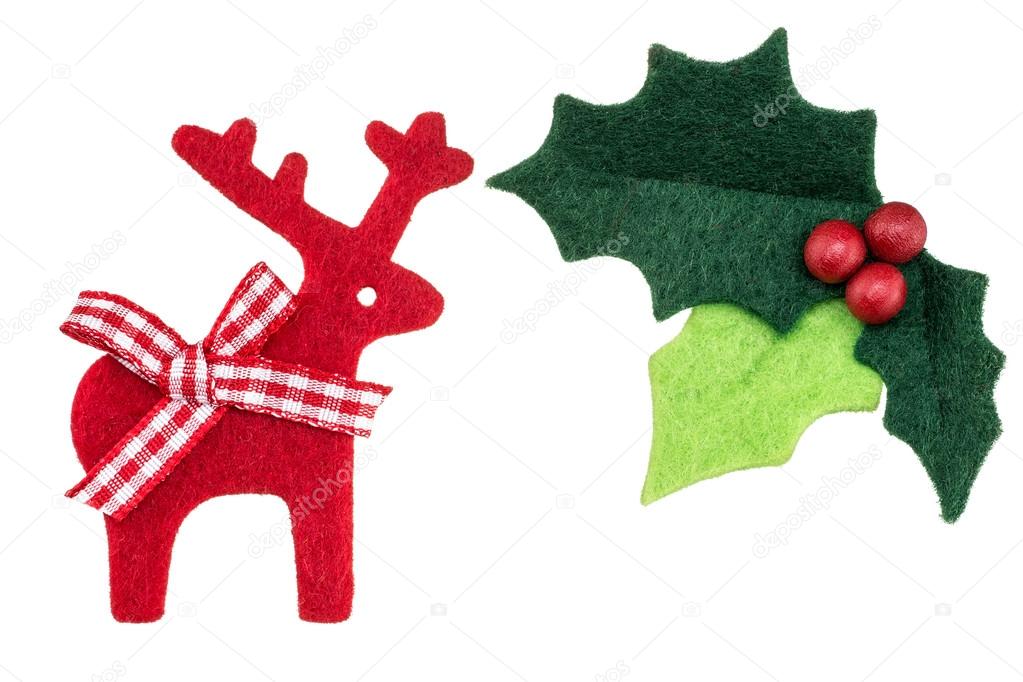 Christmas holly with red berries and reindeer isolated