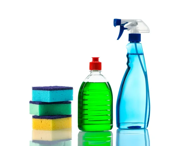 Plastic bottles of cleaning products and sponges . Isolated on white background — Stock Photo, Image