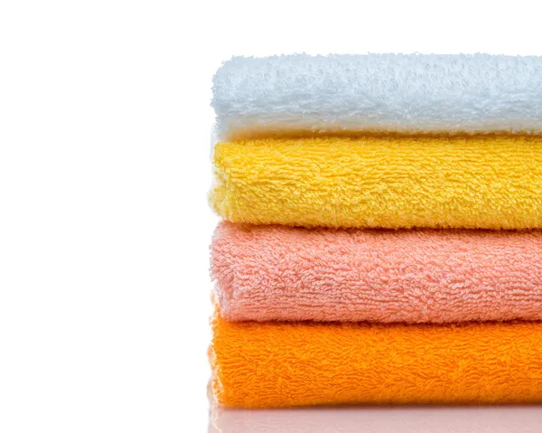 Colorful towels isolated on white — Stock Photo, Image