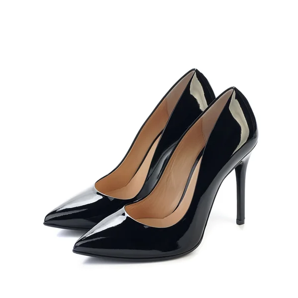 Пара черных высоких каблуков женщин классическая обувь на белом фоне — стоковое фото