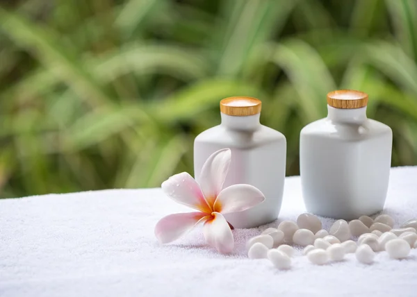 Spa and wellness setting with natural soap, stones and towel on the green background . Concept spa. — Stock Photo, Image