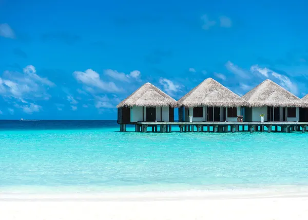 Beautiful beach with water bungalows at Maldives — Stock Photo, Image