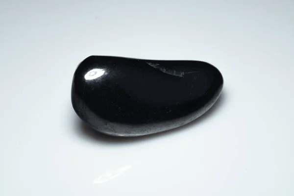 Natural Black Shungite Cabochon Background — Stock Photo, Image