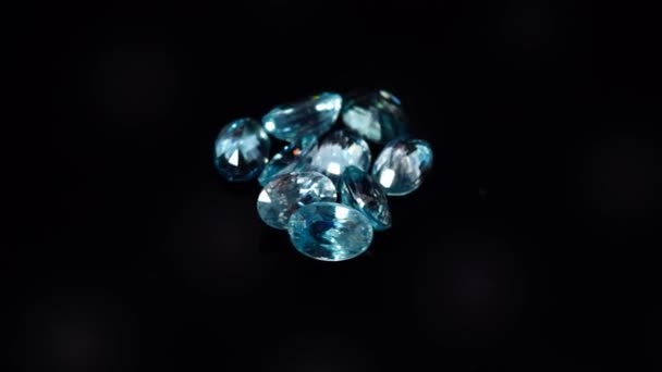 Natural blue zircon oval faceted cut on the turning table — Stock Video