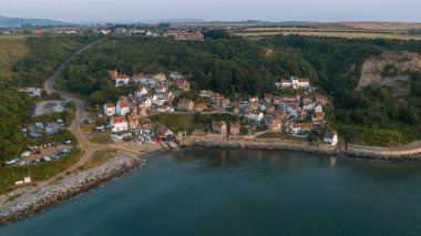 Early morning aerial view of the small North Yorkshire coastal Village Aerial of Runswick Bay, North Yorkshire