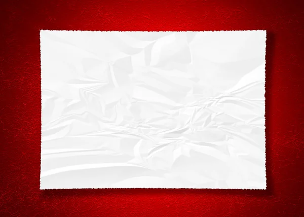 Crumpled paper on red — Stock Photo, Image