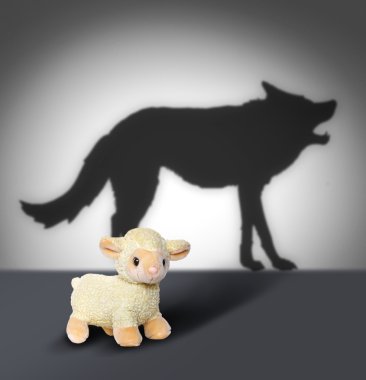 Sheep and wolf shadow. Contept graphic. clipart
