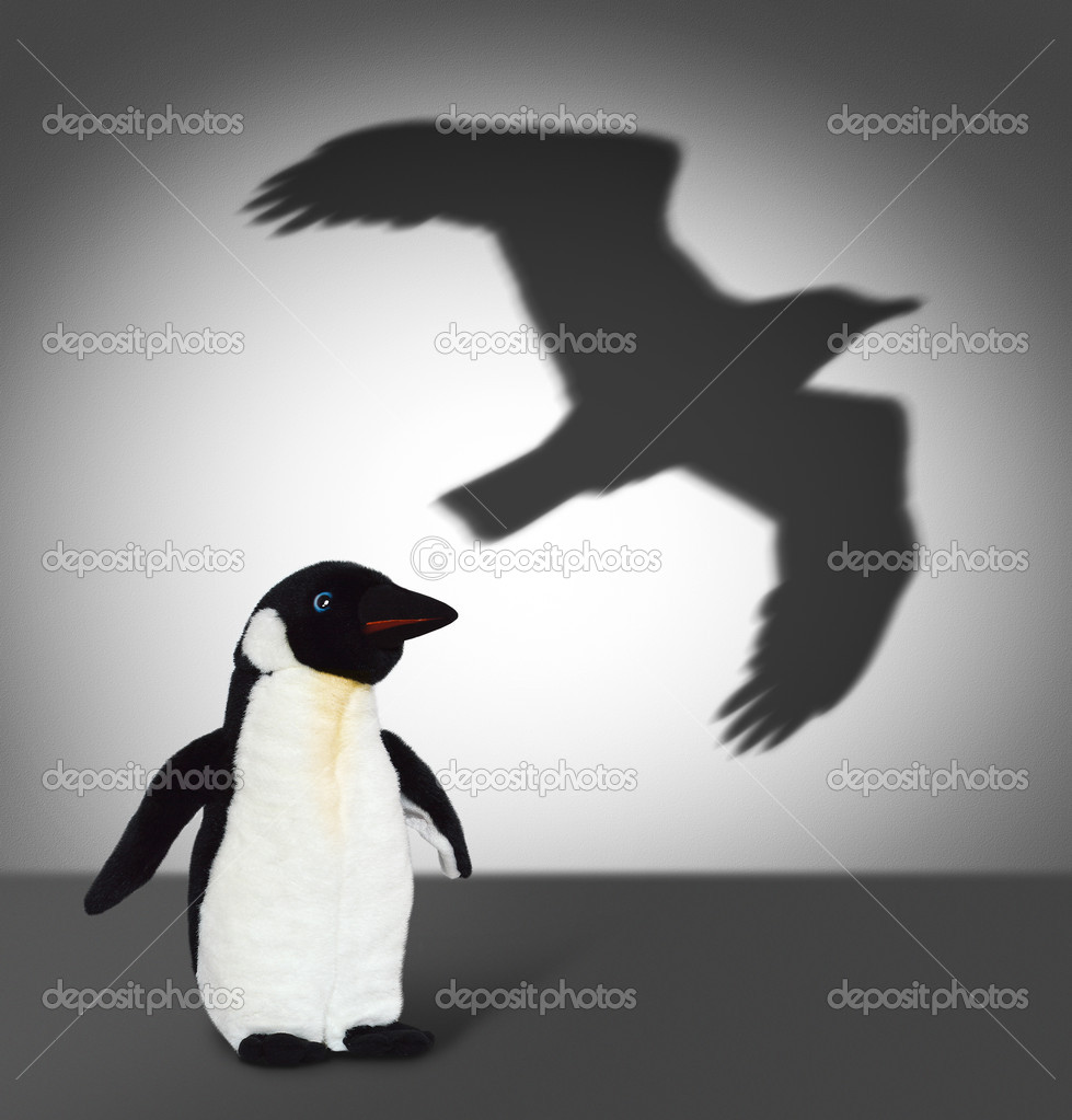 Penguin with eagle shadow. Concept graphic