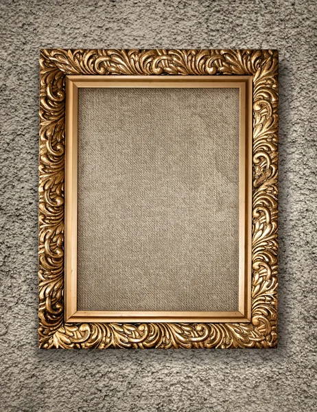 Antieke gouden frame op rustiek muur — Stockfoto