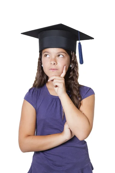 Doordachte meisje met mortarboard — Stockfoto