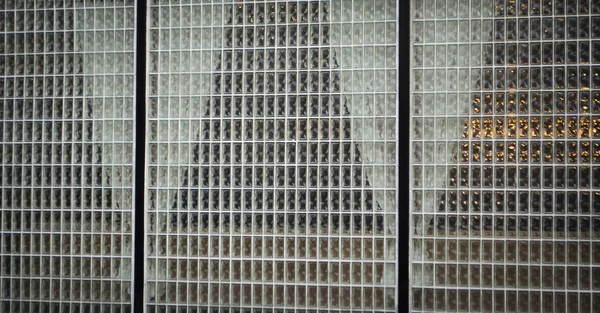 Curtains through glass block wall — Stock Photo, Image