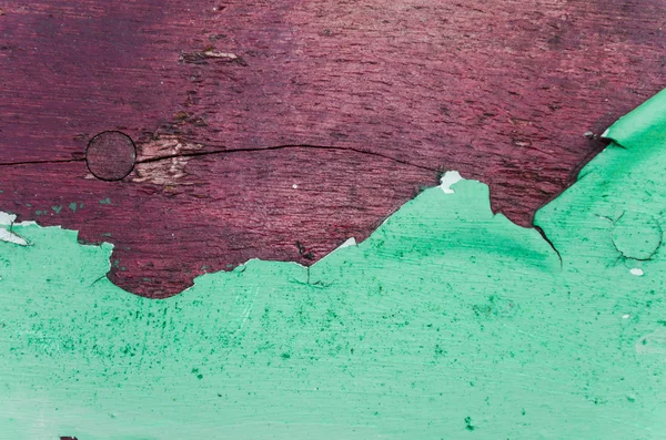 Трещина зеленой краски на дереве — стоковое фото