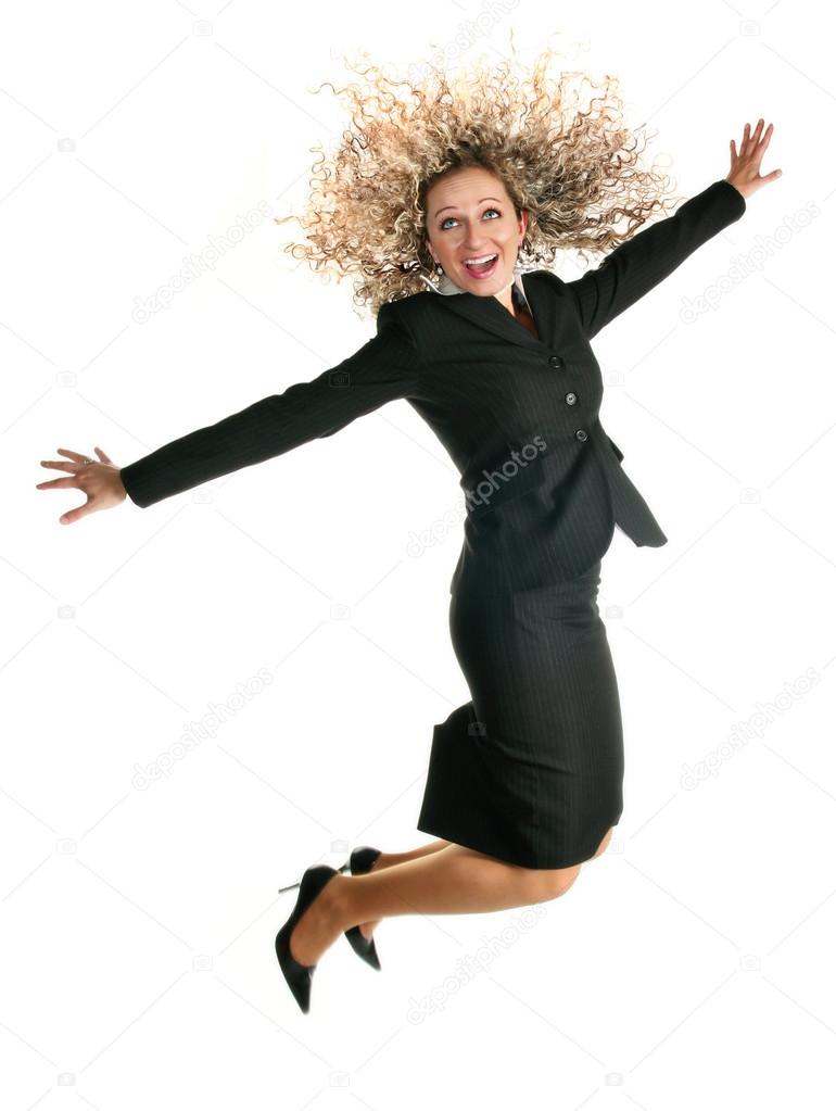 Excited jumping business woman