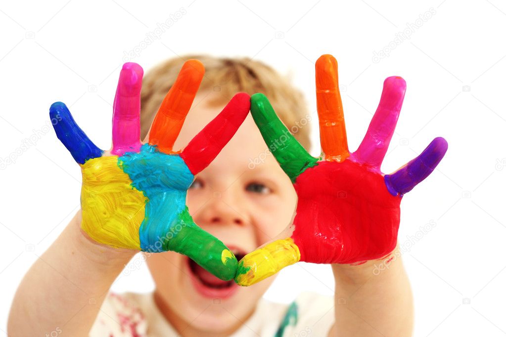 Happy child with painted hands