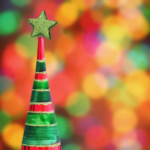 Christmas tree on defocused lights background — Stock Photo, Image