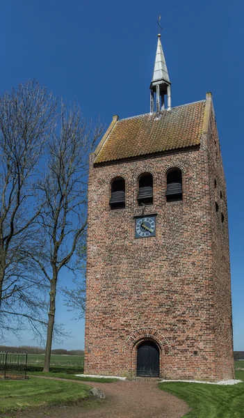 Bell tower of the church of Garmerwolde — стокове фото