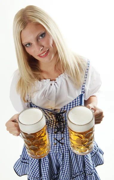 Woman with two beer mugs — Stock Photo, Image