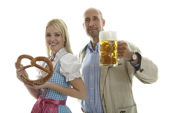 Mulher em Dirndl e Homem em Calças de Couro — Fotografia de Stock