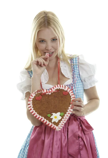 Woman with German Gingerbread heart — Stock Photo, Image