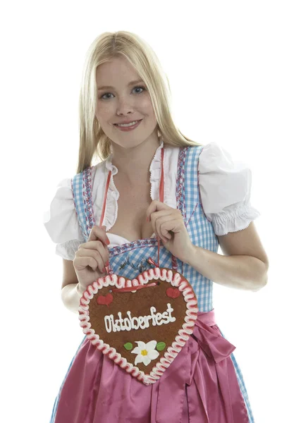 Woman with German Gingerbread heart — Stock Photo, Image