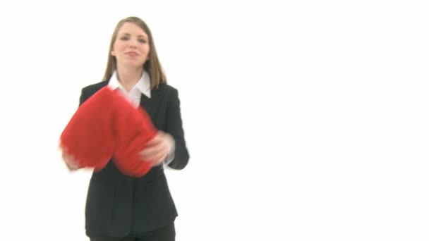 Woman with heart pillow — Stock Video