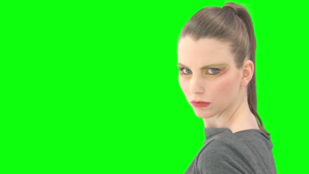 Woman with greenscreen and alpha matte — Wideo stockowe