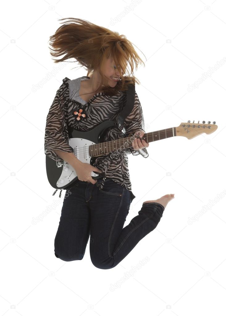 Young rock lady with an electric guitar