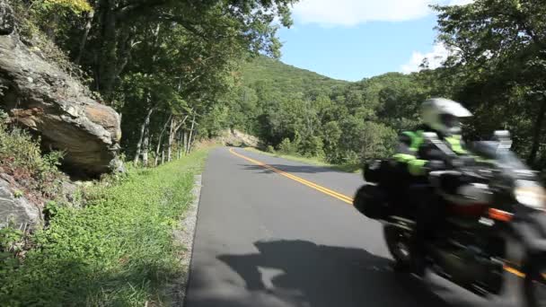 Biker passing by on Blue Ridge Parkway — Stock Video