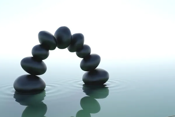 Boog van zen stenen in water — Stockfoto