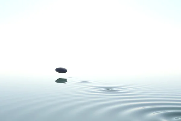 Zen-Stein auf das Wasser geworfen — Stockfoto