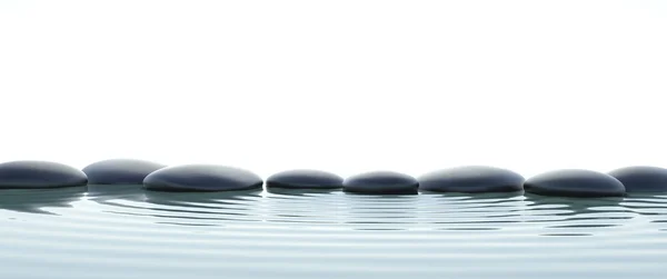 Zen stones in water on widescreen — Stock Photo, Image