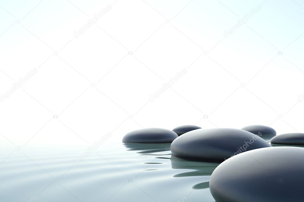 Zen stones in water on white background