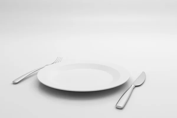 Gaffel, kniv och plattan på vit bakgrund — Stockfoto