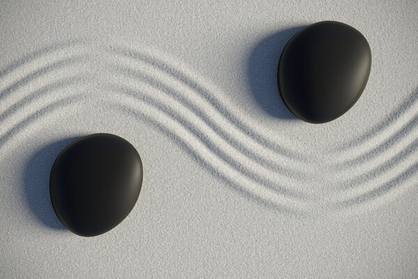 Дзен сад в верхней части зрения с камнями, разделенными волной
