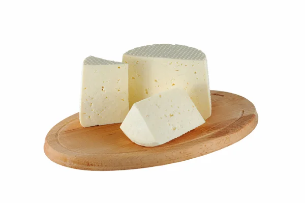 Cheese on cutting board — Stock Photo, Image