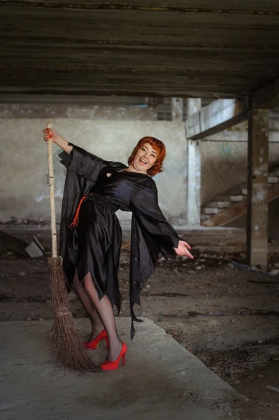 Witch with broom — Stock Photo, Image