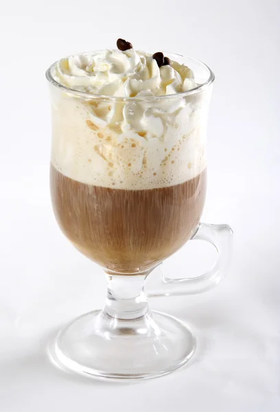 A cup of cappuccino with whipped cream — Stock Photo, Image