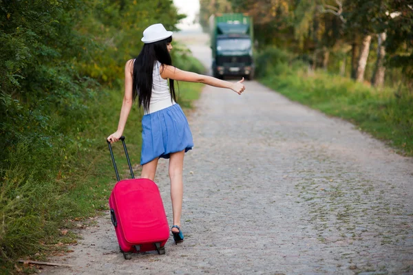 Jonge vrouw liften Stockfoto