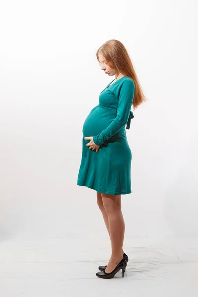 Pregnant Redhead Woman Her Big Belly Wearing Green Dress Shot — Stock Photo, Image