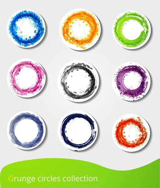 Set of bright grunge circles — Stock Vector