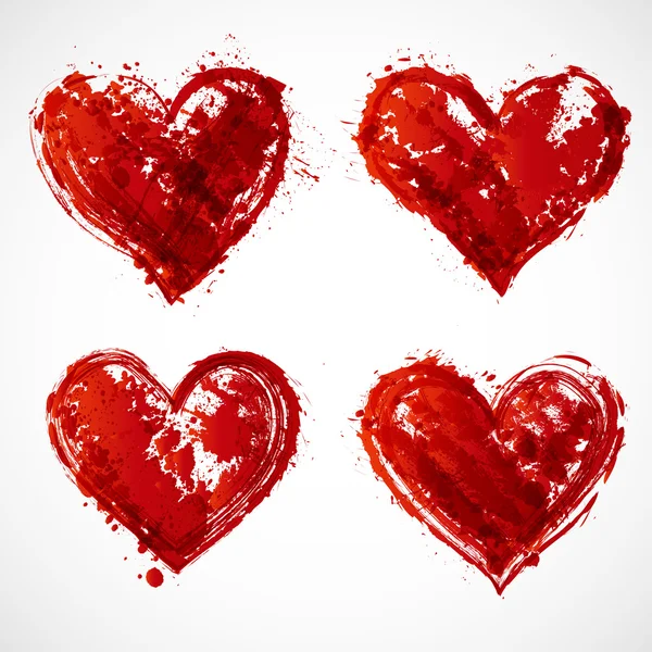 Ensemble de cœurs rouges grunge . — Image vectorielle