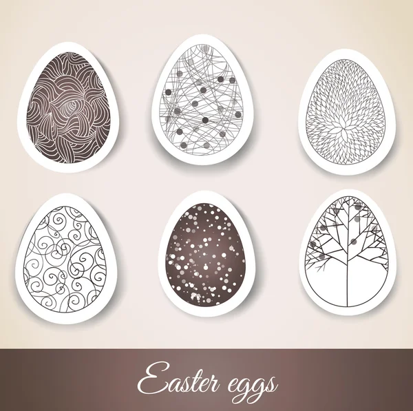 Conjunto de huevos de Pascua con patrones en papel cortado — Vector de stock